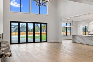 Living room by Home Plans NW